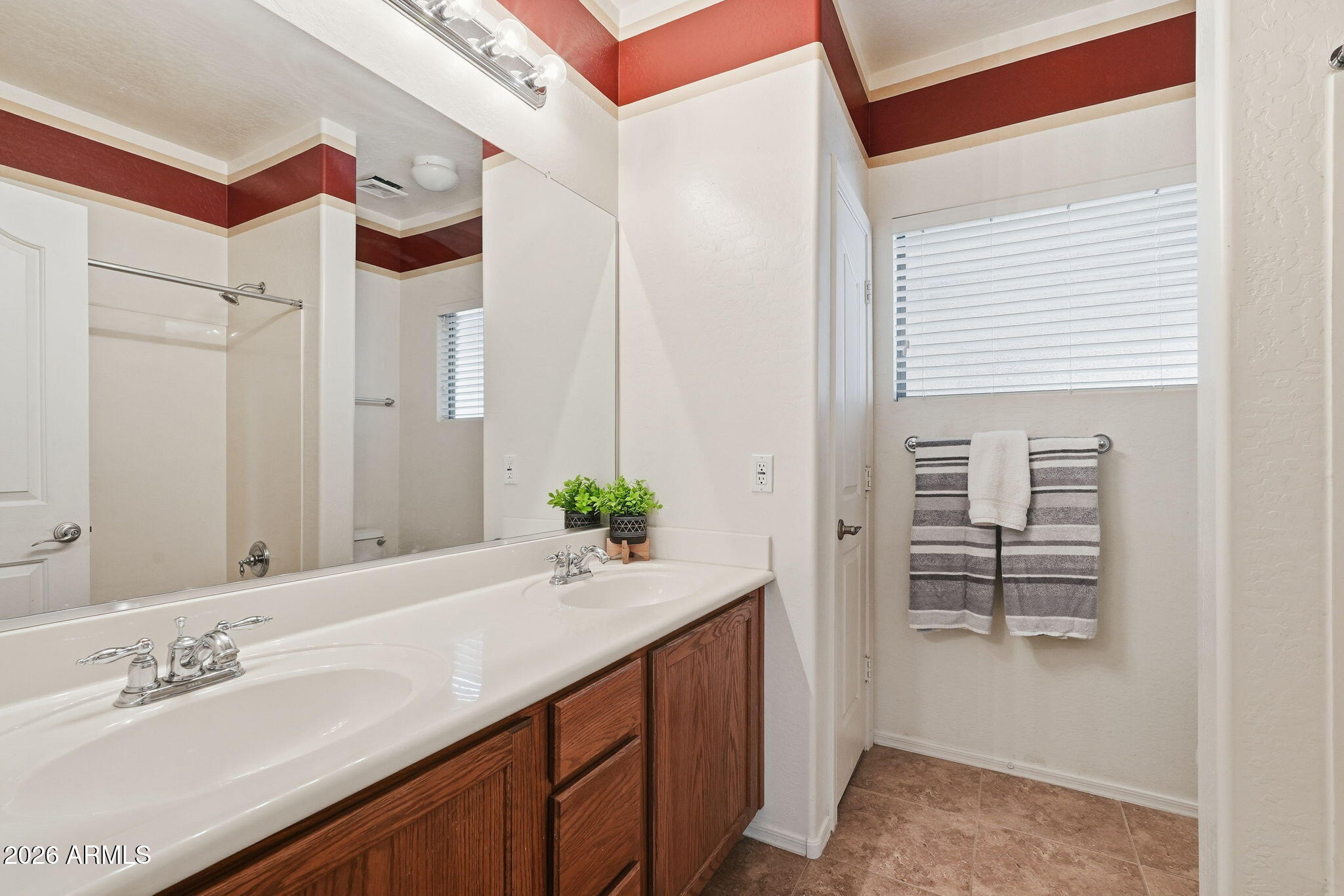9917 Barley Road Florence, AZ 85132 - Photo 26 of 53 a bathroom with a sink and a mirror