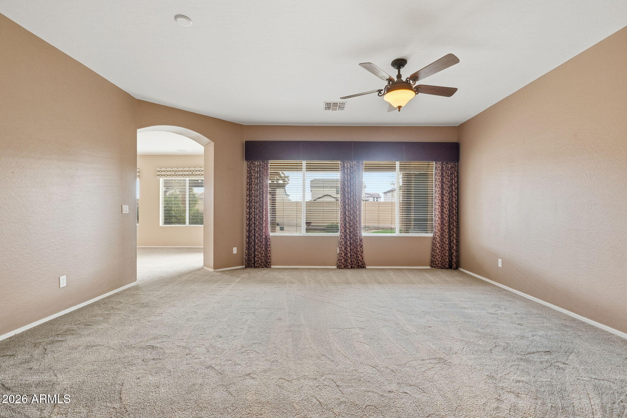 9917 Barley Road Florence, AZ 85132 - Photo 38 of 53 a view of an empty room with a window