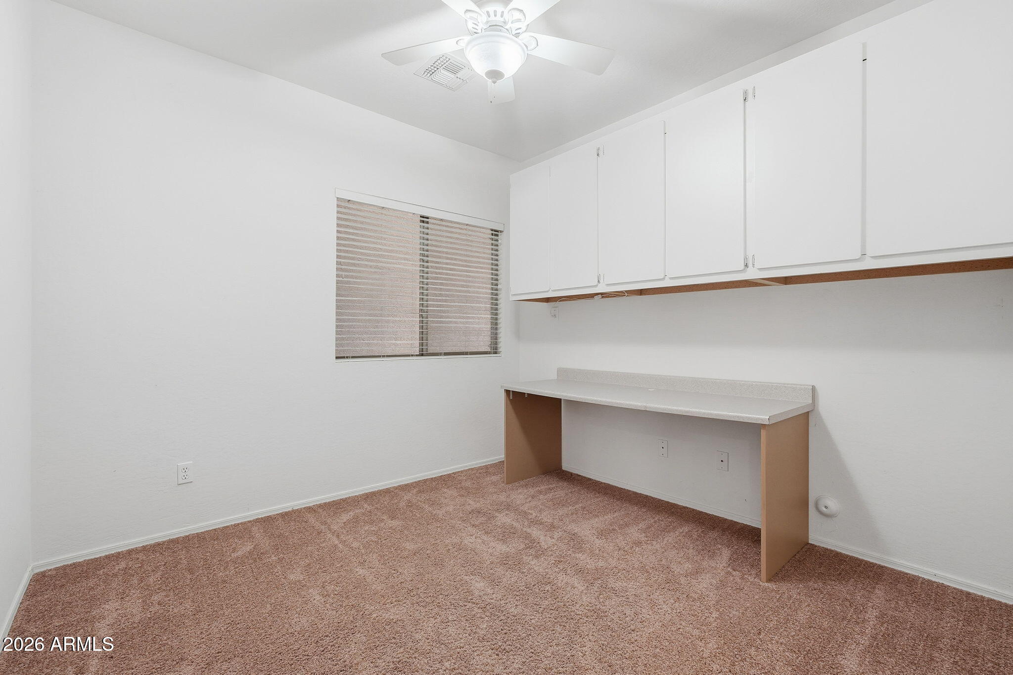 9917 Barley Road Florence, AZ 85132 - Photo 39 of 53 an empty room with cabinet