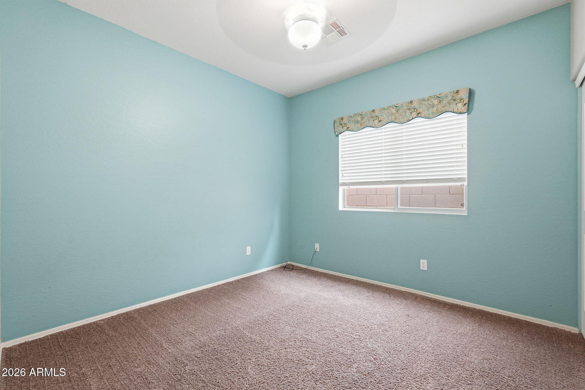 9917 Barley Road Florence, AZ 85132 - Photo 41 of 53 an empty room with a window