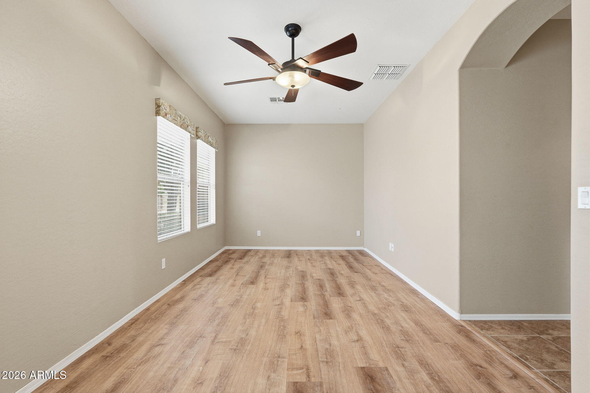 9917 Barley Road Florence, AZ 85132 - Photo 43 of 53 wooden floor in an empty room with a window