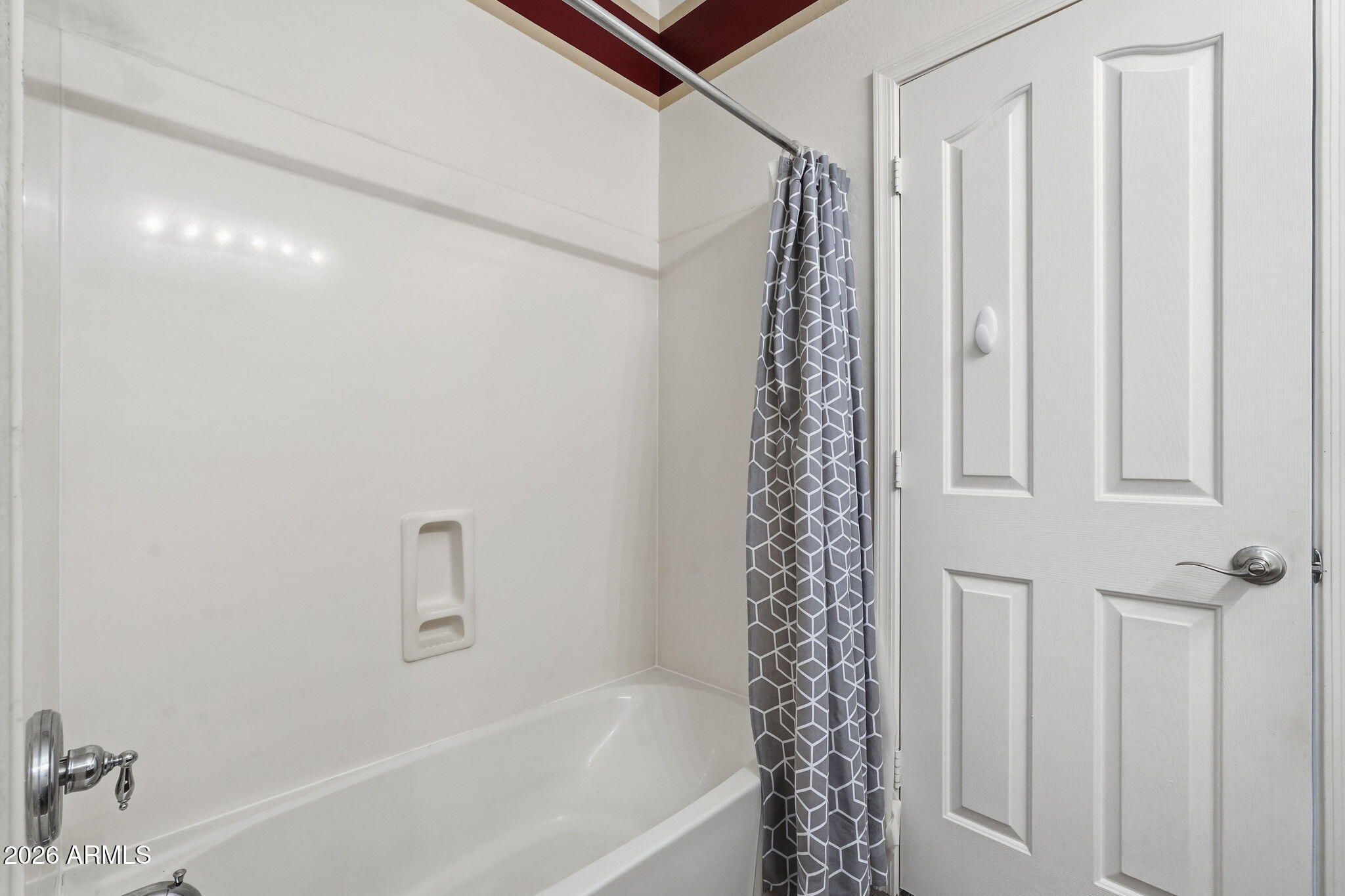 9917 Barley Road Florence, AZ 85132 - Photo 49 of 53 a bathroom with a shower curtain and a bathtub