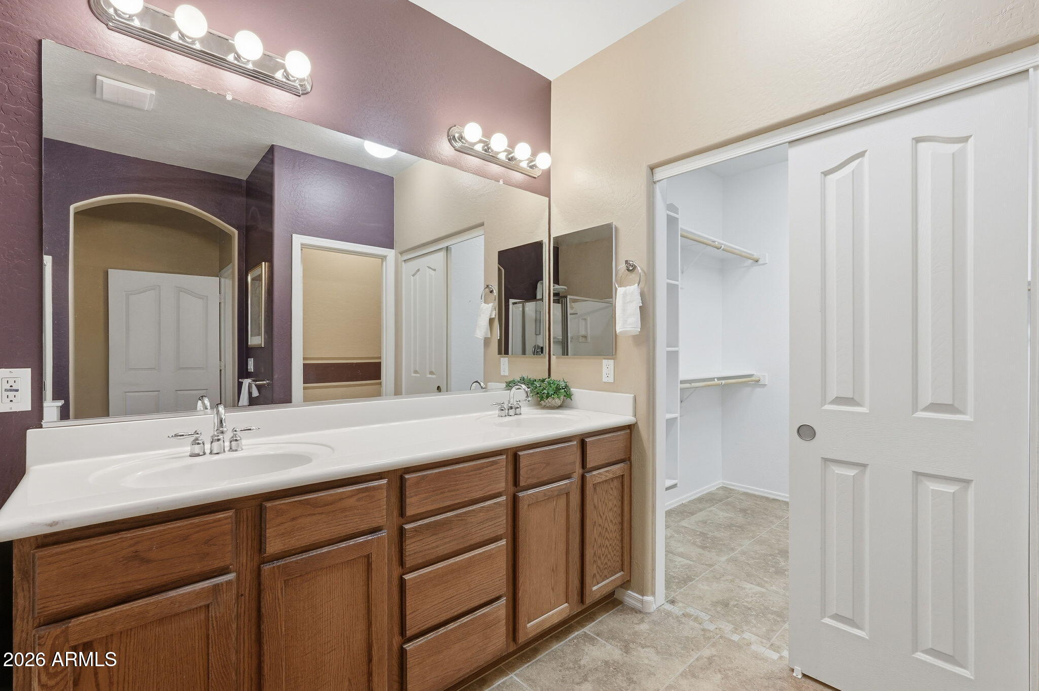 9917 Barley Road Florence, AZ 85132 - Photo 50 of 53 a bathroom with a double vanity sink and a mirror