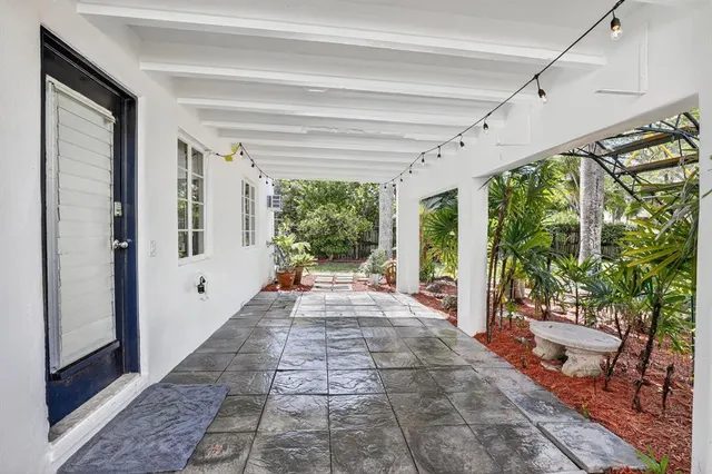 a view of a backyard with a patio