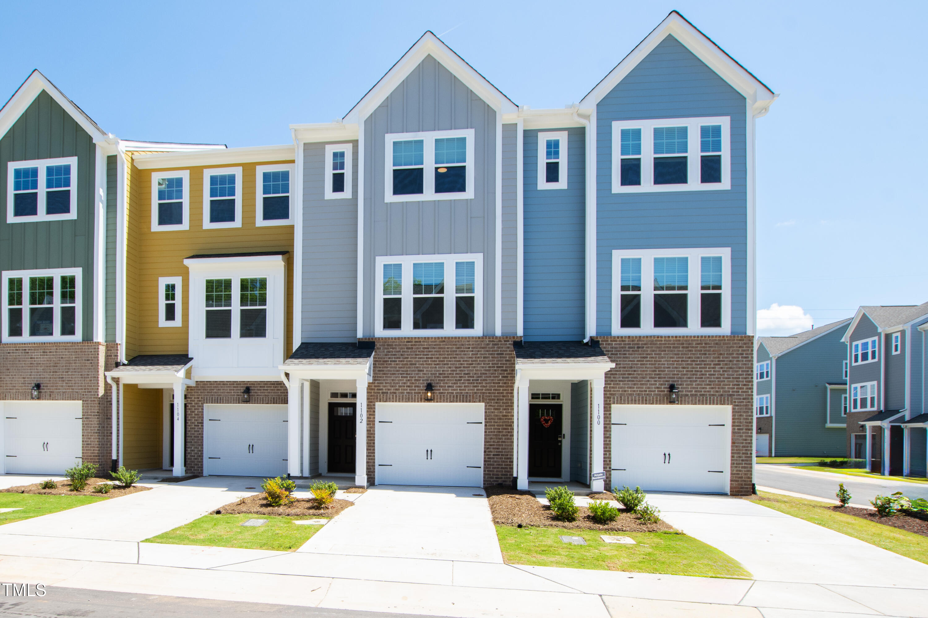 1102 Harmony Trail Durham, NC 27703 - Photo 1 of 33 a view of a house with a swimming pool