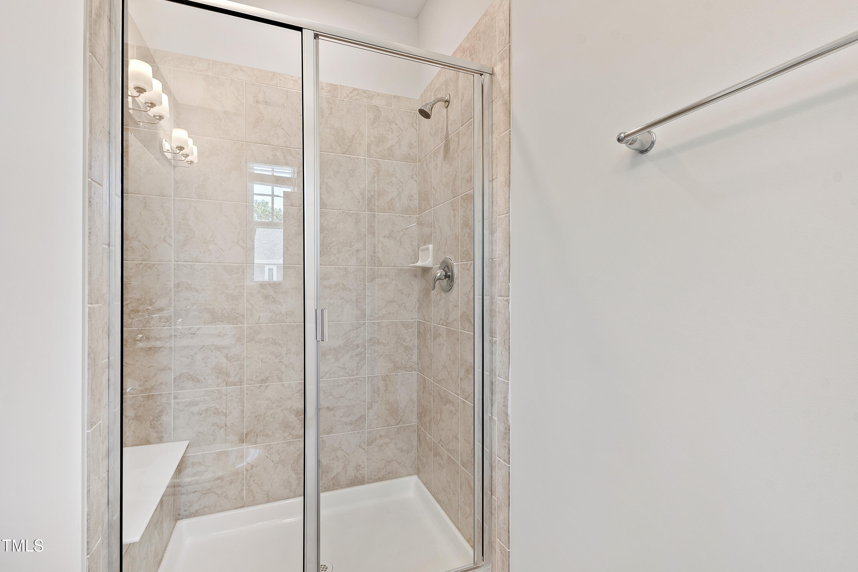 1102 Harmony Trail Durham, NC 27703 - Photo 18 of 33 a bathroom with a glass shower door