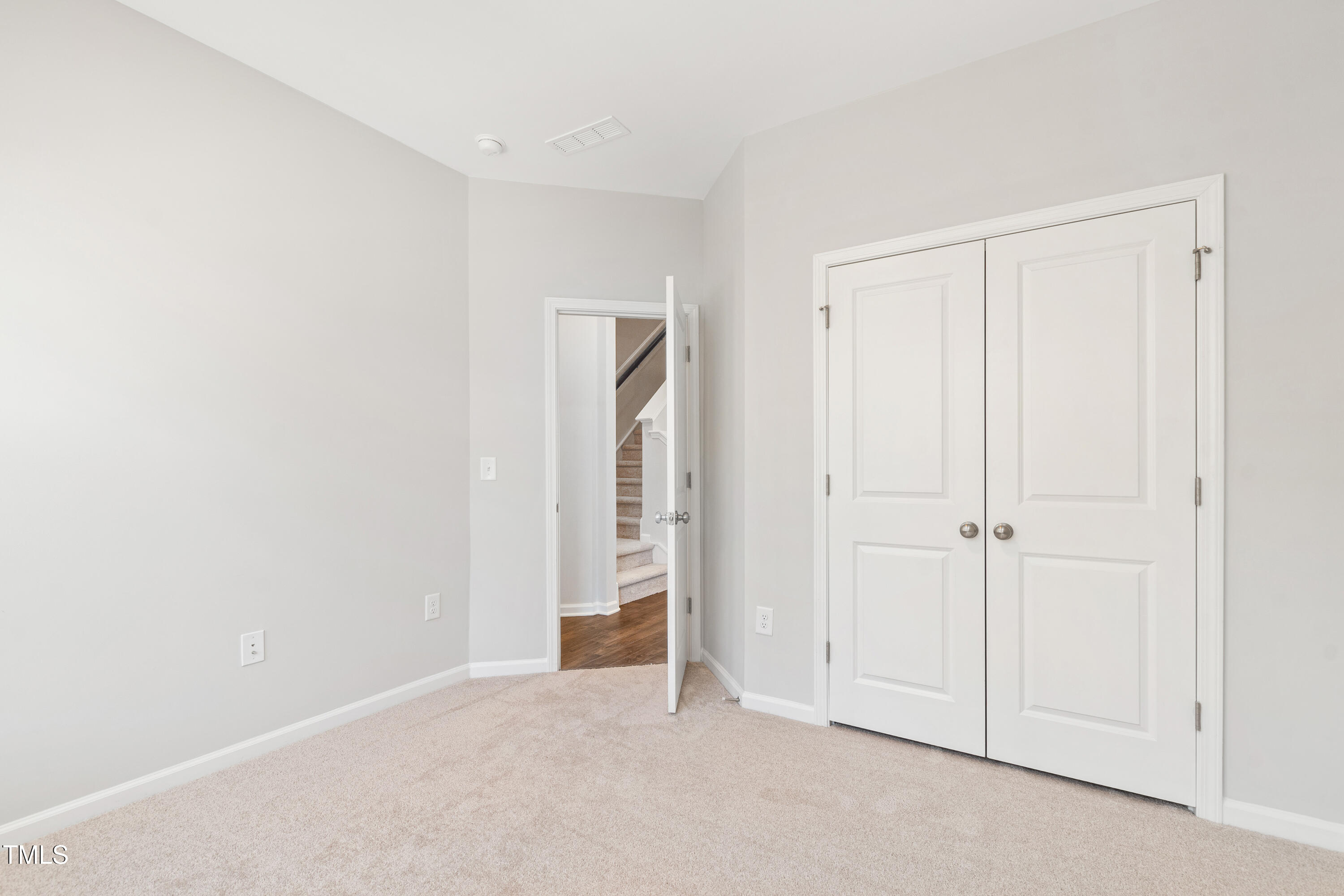 1102 Harmony Trail Durham, NC 27703 - Photo 20 of 33 an empty room with closet area