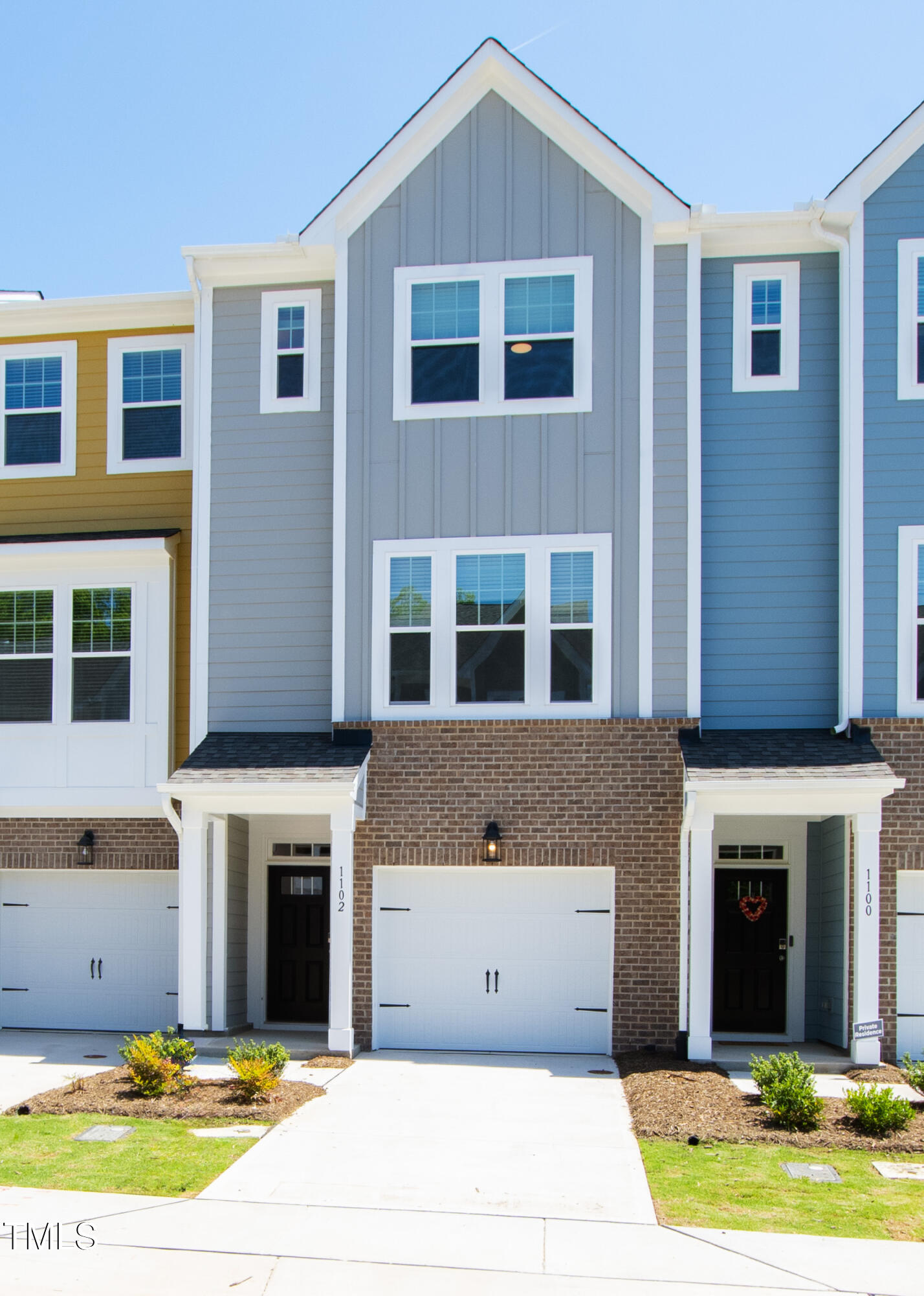 1102 Harmony Trail Durham, NC 27703 - Photo 2 of 33 a view of building with yard