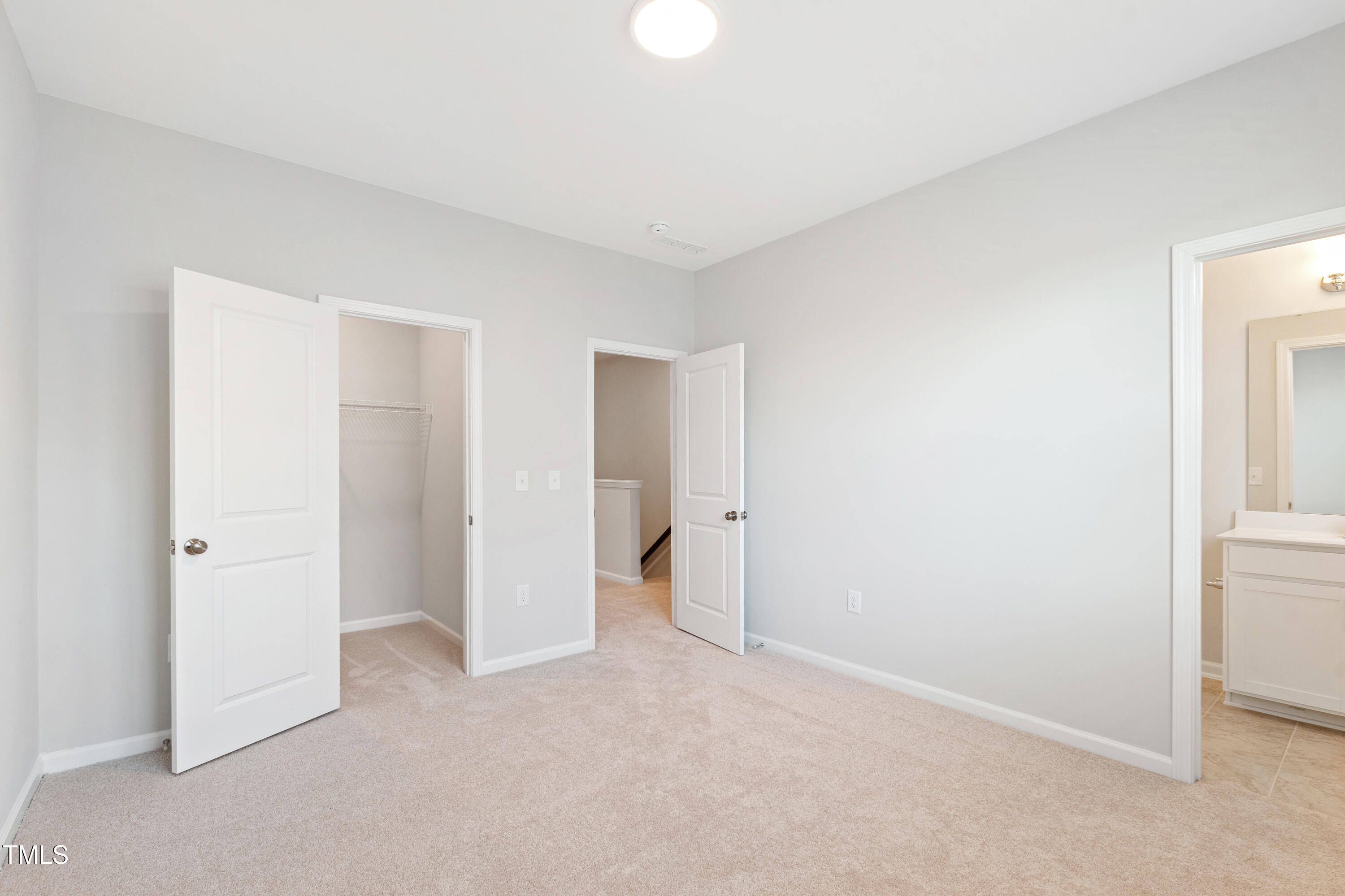 1102 Harmony Trail Durham, NC 27703 - Photo 22 of 33 an empty room with closet area