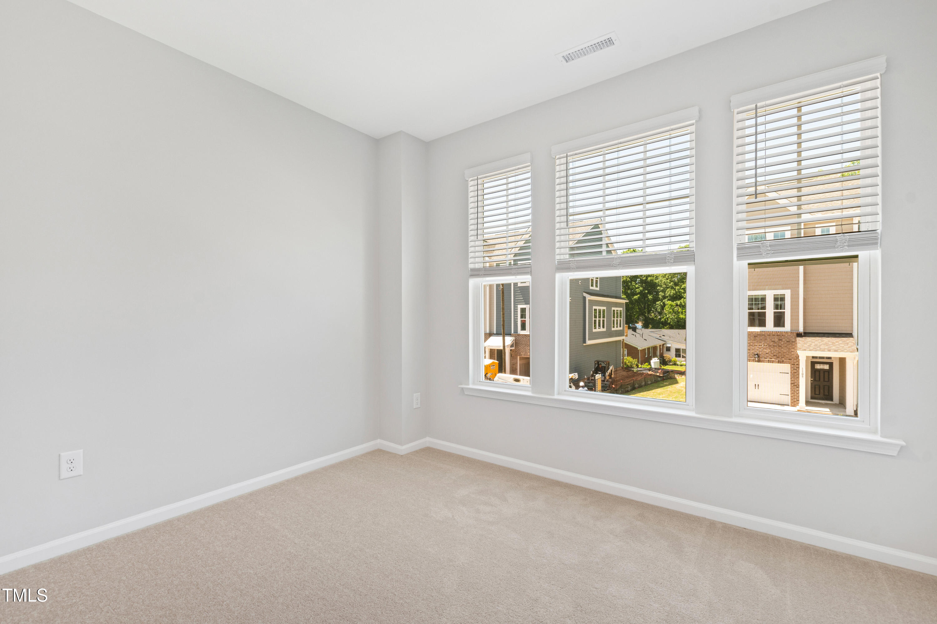 1102 Harmony Trail Durham, NC 27703 - Photo 25 of 33 a view of an empty room with a window