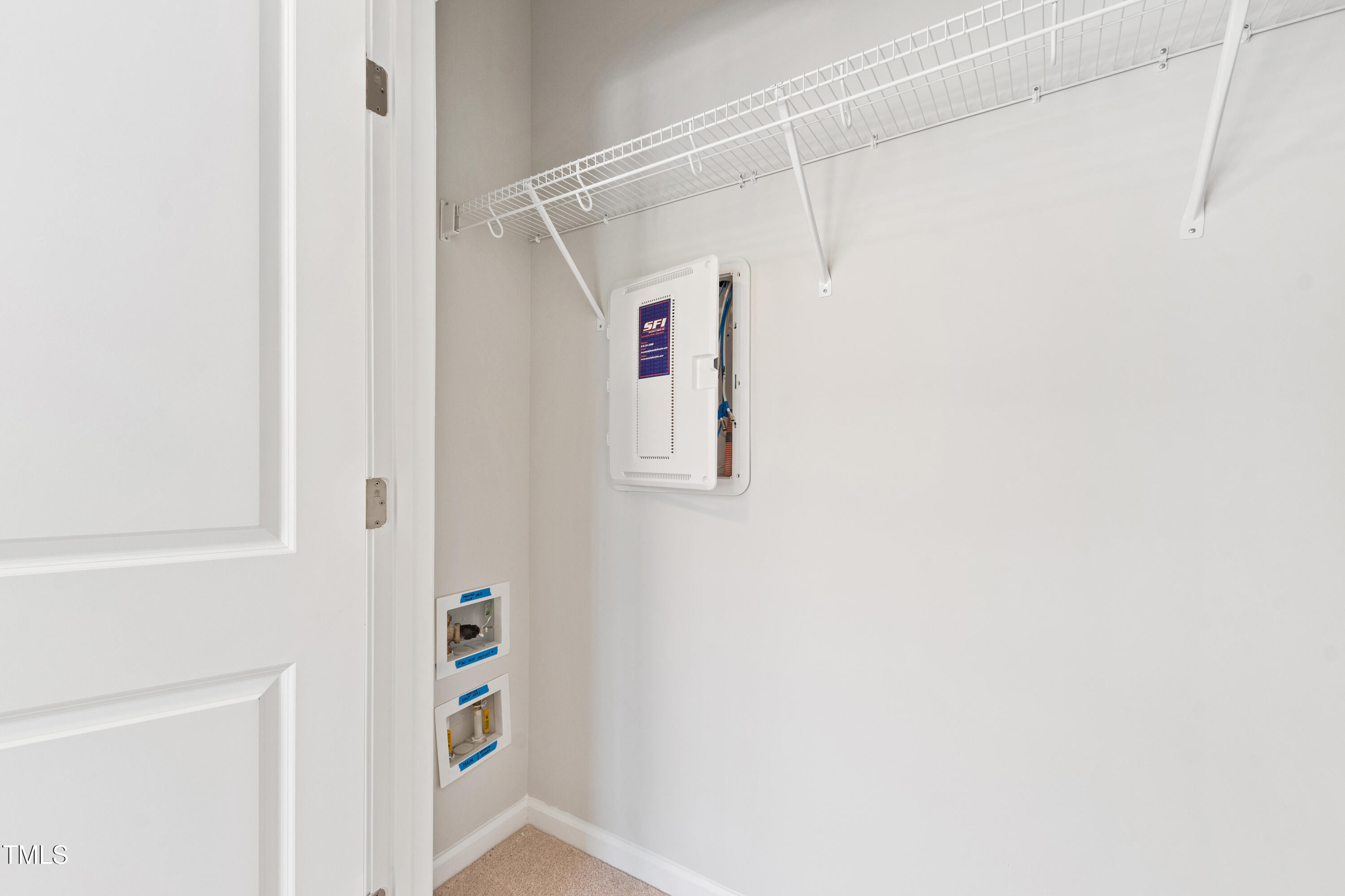 1102 Harmony Trail Durham, NC 27703 - Photo 28 of 33 a view of walk in closet with empty racks