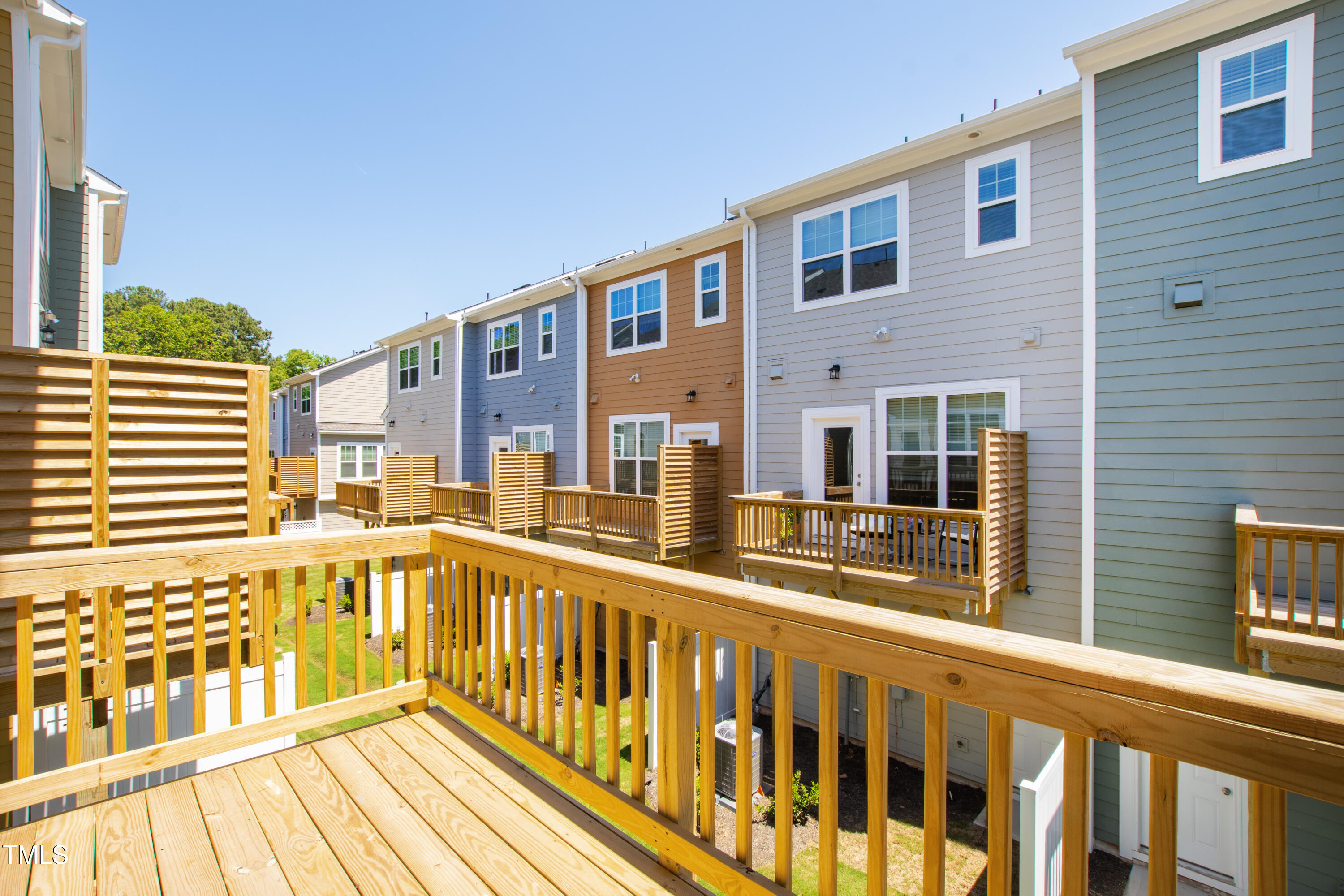 1102 Harmony Trail Durham, NC 27703 - Photo 33 of 33 a view of a large building with a balcony