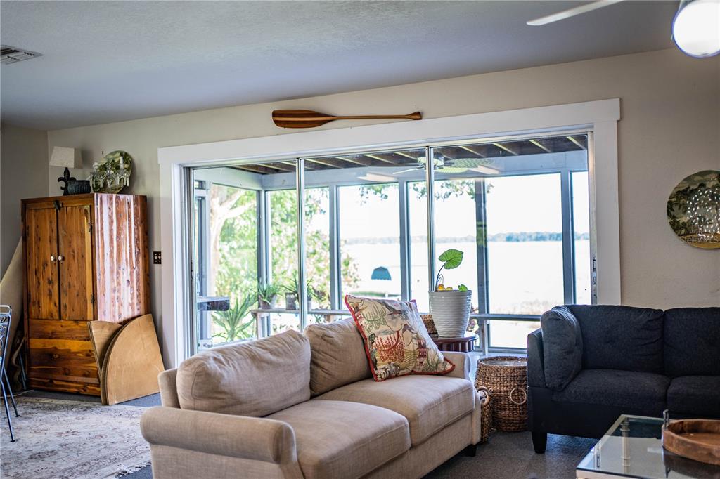 1702 North Scenic Highway Babson Park, FL 33827 - Photo 16 of 46 a living room with furniture and a large window