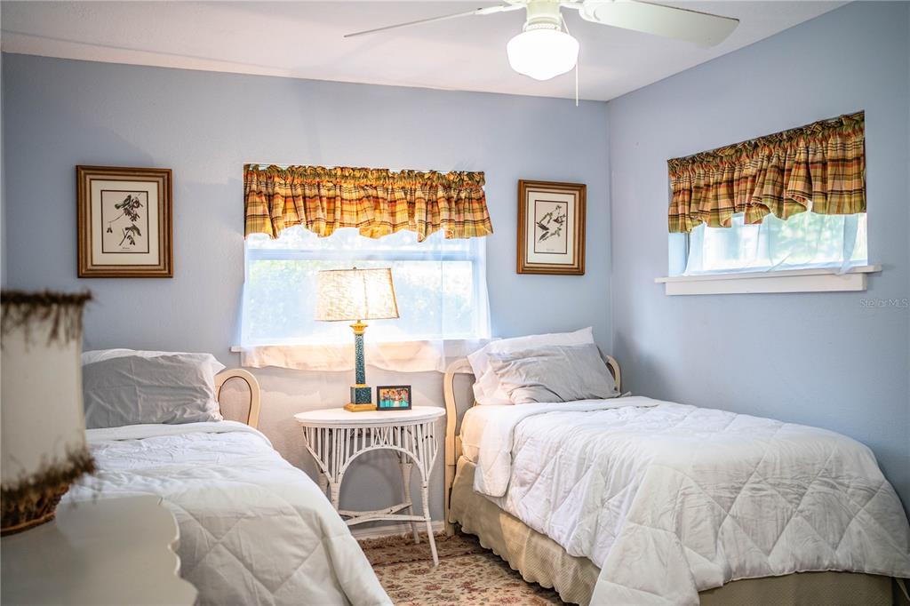 1702 North Scenic Highway Babson Park, FL 33827 - Photo 26 of 46 a bedroom with a bed and a window