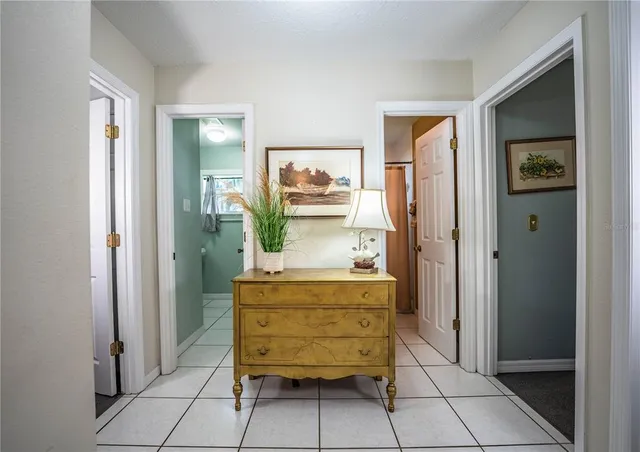 a view of room with furniture and wooden floor