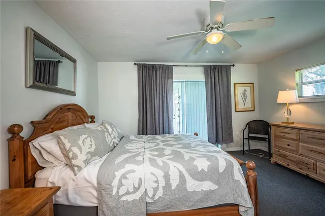 a bedroom with a bed and furniture