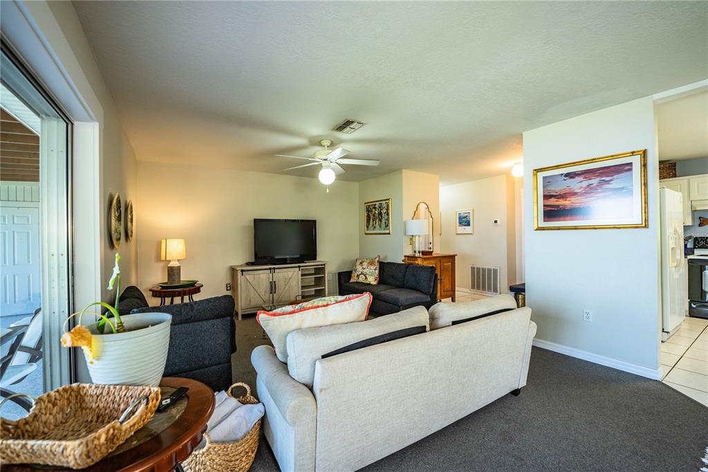 1702 North Scenic Highway Babson Park, FL 33827 - Photo 6 of 46 a living room with furniture and a flat screen tv