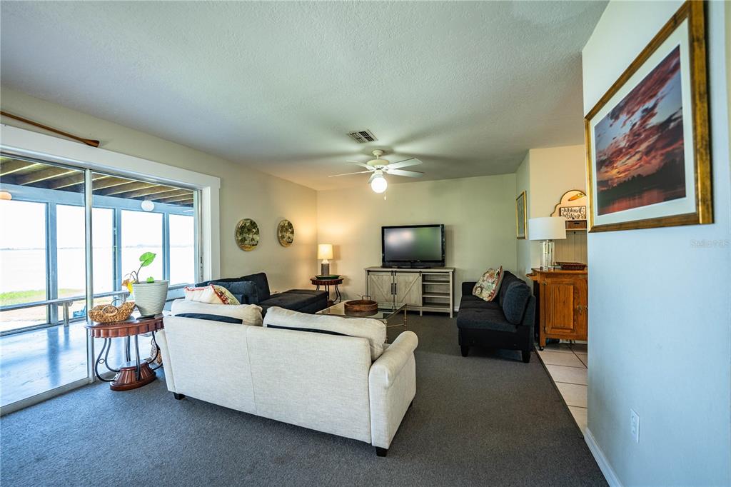 1702 North Scenic Highway Babson Park, FL 33827 - Photo 9 of 46 a living room with furniture and a flat screen tv