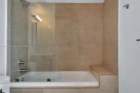 a bathroom with a bathtub