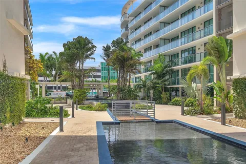 a view of building with yard