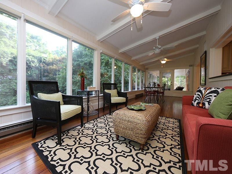 513 Spring Valley Drive Raleigh, NC 27609 - Photo 14 of 25 a living room with furniture and a large window