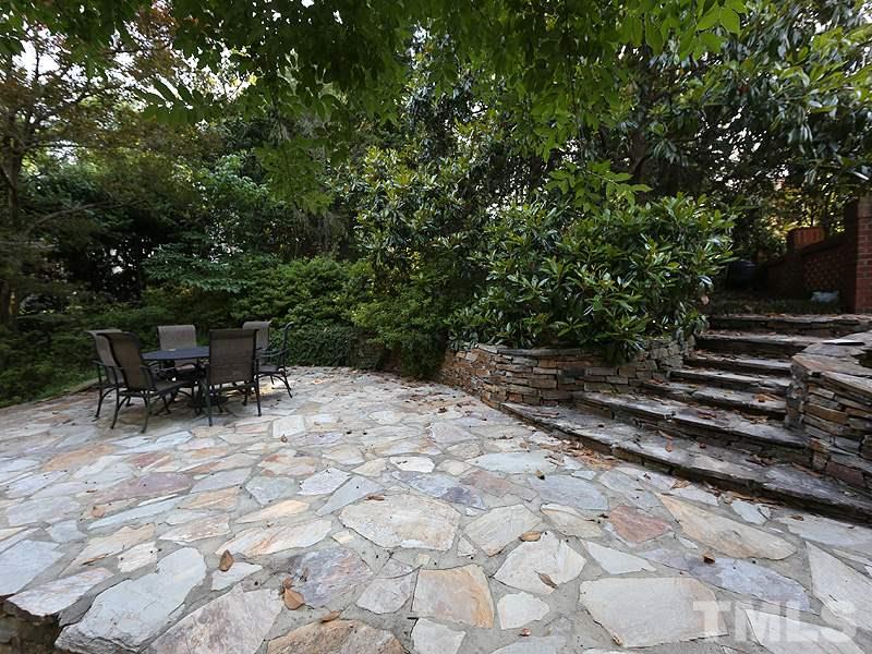 513 Spring Valley Drive Raleigh, NC 27609 - Photo 8 of 25 a view of backyard with sitting area