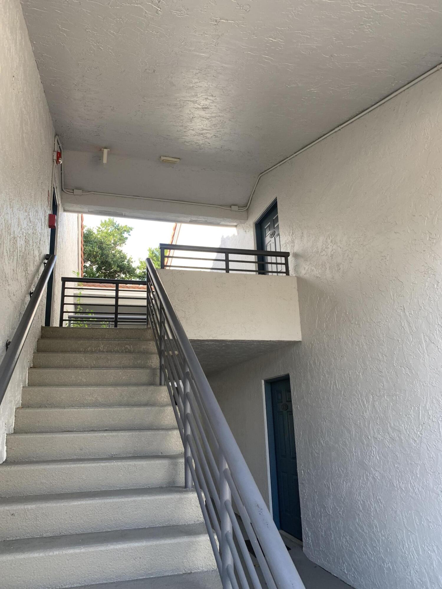 651 Lyons Road, Unit 10207 Coconut Creek, FL 33063 - Photo 10 of 14 Stairs