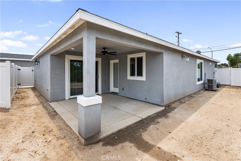 6018 William Street Riverside, CA 92504 - Photo 30 of 59 a front view of a house with a yard