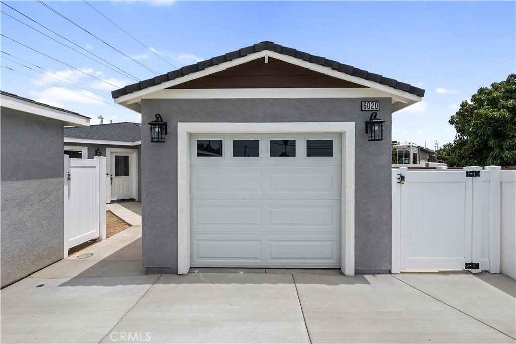 6018 William Street Riverside, CA 92504 - Photo 32 of 59 a front view of a house with a yard