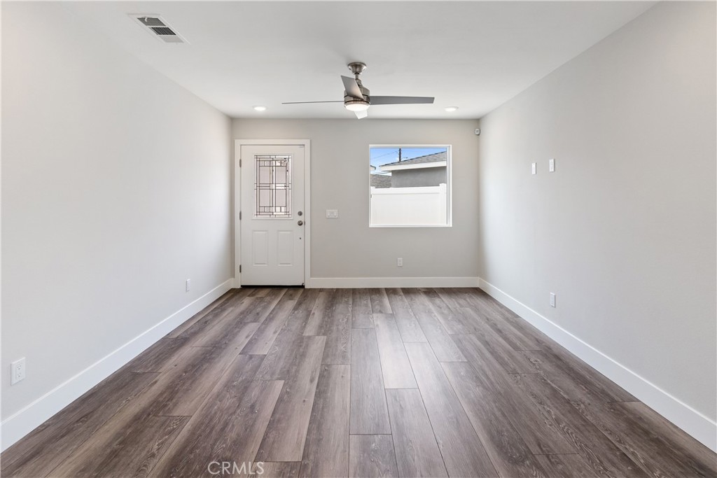 6018 William Street Riverside, CA 92504 - Photo 35 of 59 wooden floor in an empty room with a window
