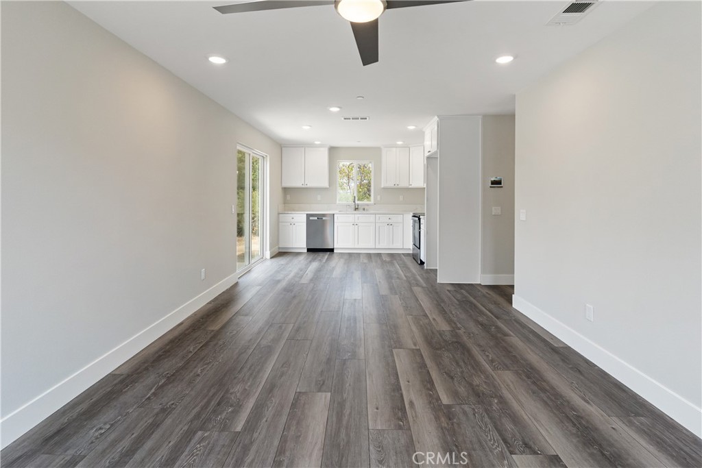6018 William Street Riverside, CA 92504 - Photo 36 of 59 a view of a kitchen with wooden floor