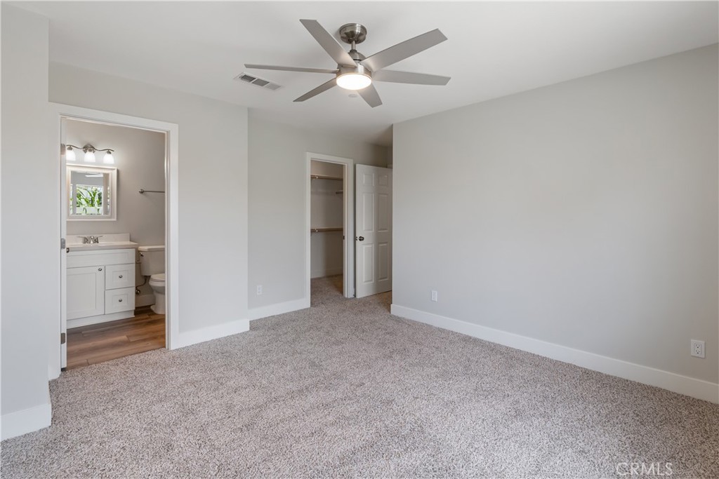 6018 William Street Riverside, CA 92504 - Photo 43 of 59 an empty room and chandelier fan