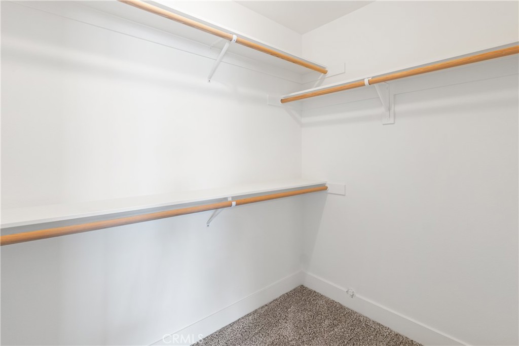 6018 William Street Riverside, CA 92504 - Photo 46 of 59 a view of small space with racks on the wall