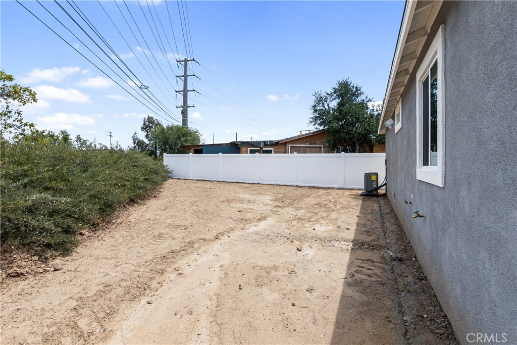 6018 William Street Riverside, CA 92504 - Photo 55 of 59 a view of a yard with wooden fence