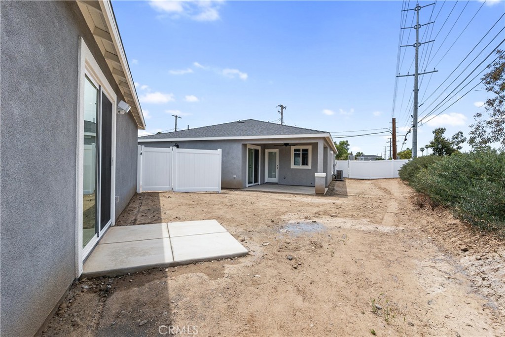 6018 William Street Riverside, CA 92504 - Photo 57 of 59 a front view of a house with a yard