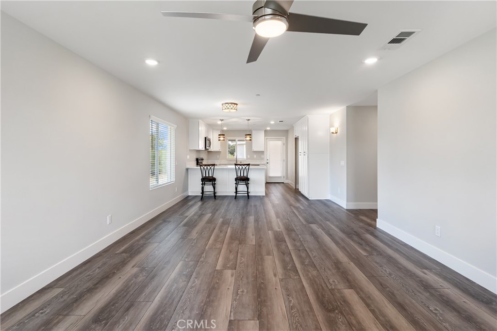 6018 William Street Riverside, CA 92504 - Photo 10 of 59 a view of kitchen and wooden floor