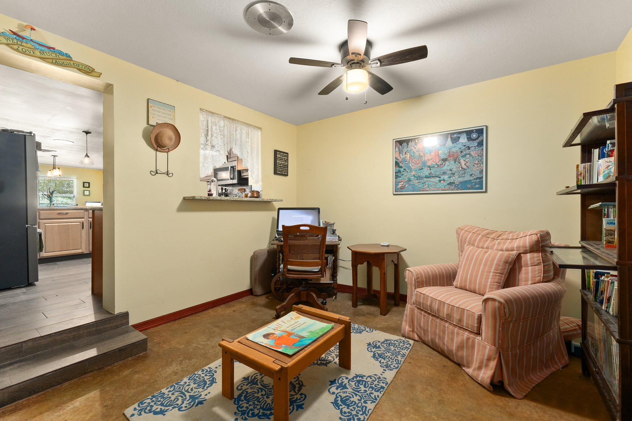 340 North Ffa Road Fort Pierce, FL 34945 - Photo 20 of 72 a living room with furniture and a table
