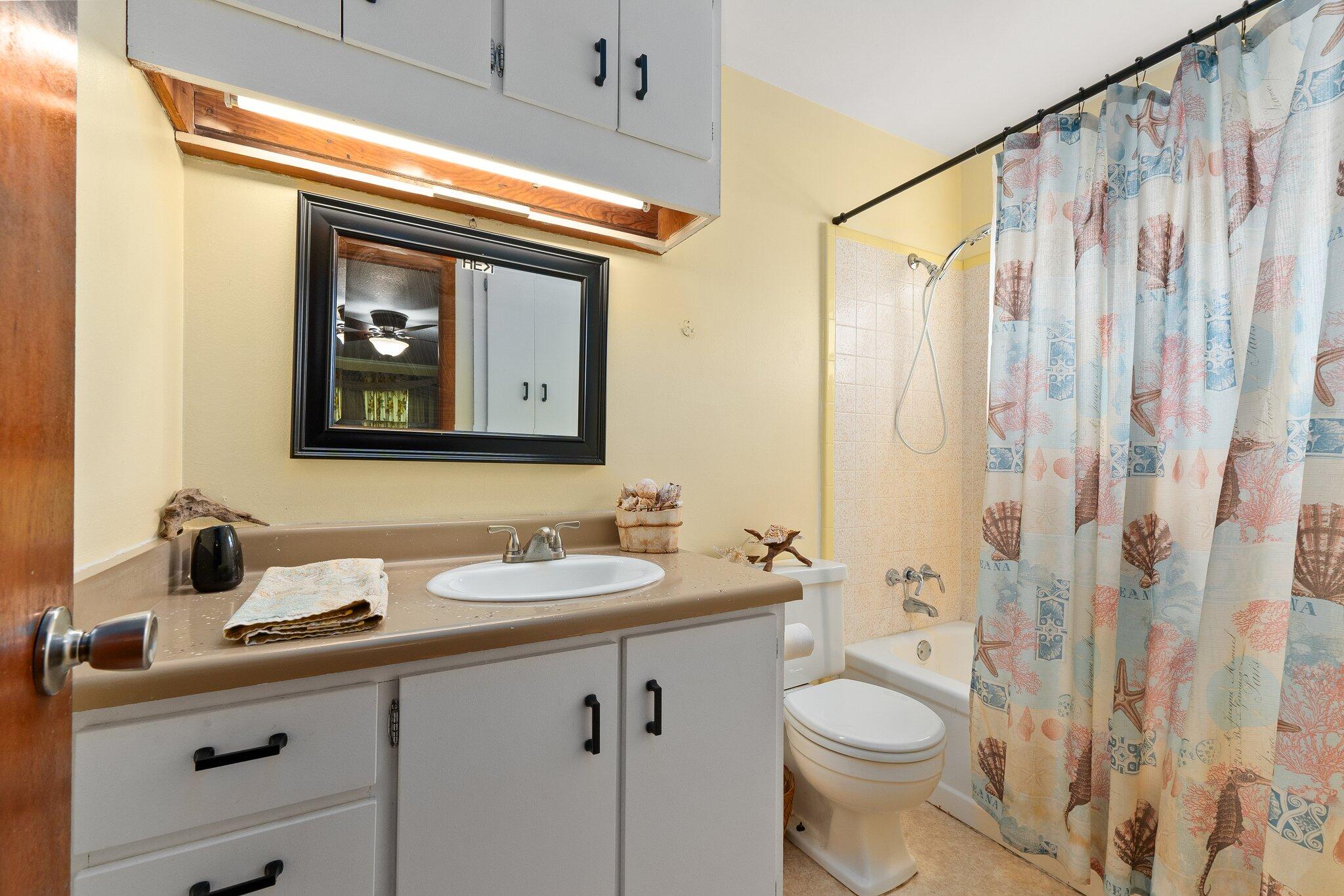 340 North Ffa Road Fort Pierce, FL 34945 - Photo 22 of 72 a bathroom with a sink a toilet and shower