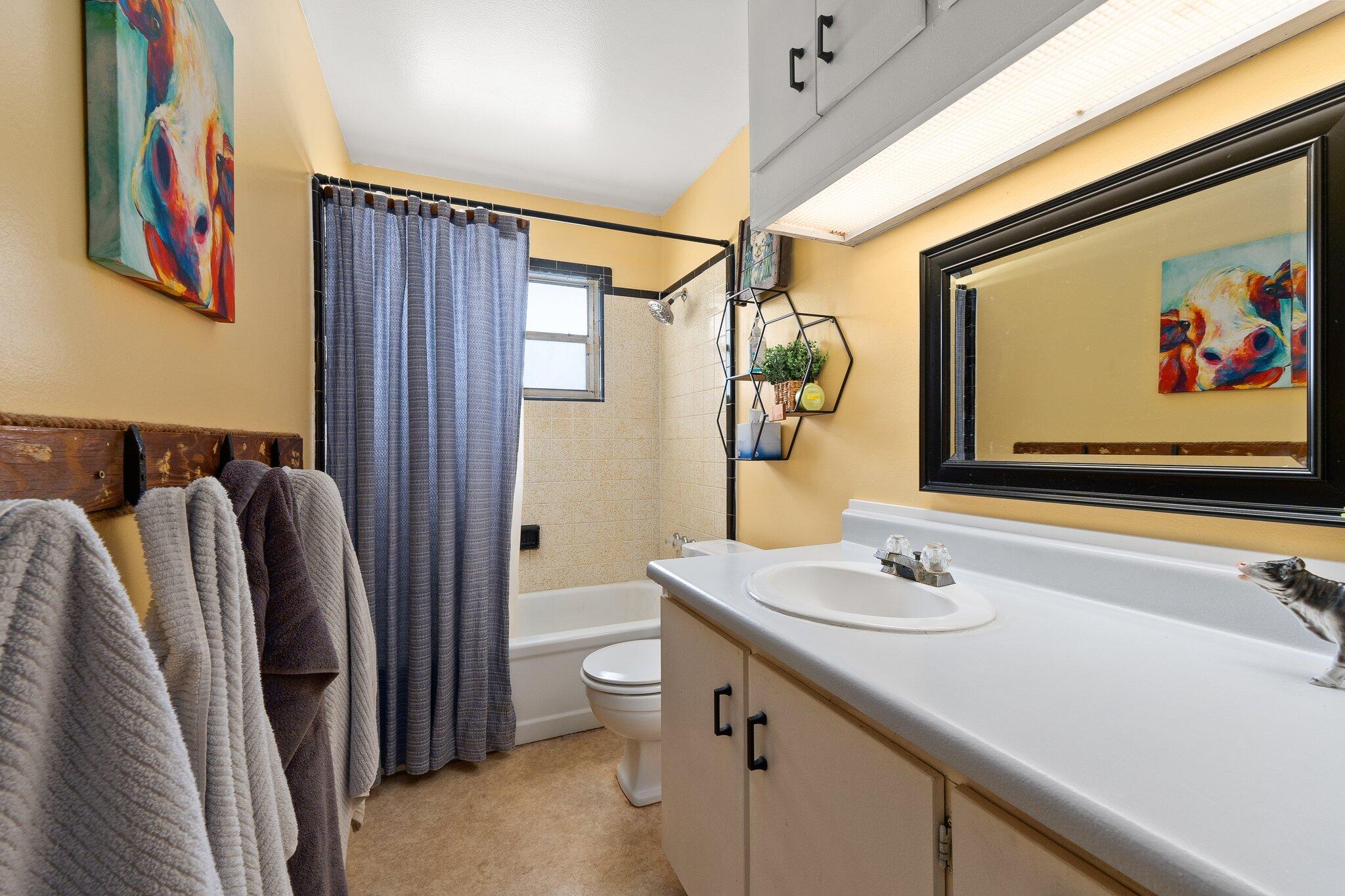 340 North Ffa Road Fort Pierce, FL 34945 - Photo 25 of 72 a bathroom with a sink and a mirror