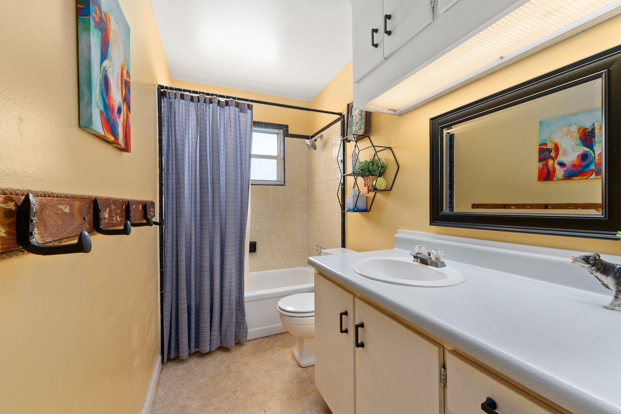 340 North Ffa Road Fort Pierce, FL 34945 - Photo 27 of 72 a bathroom with a sink and a mirror