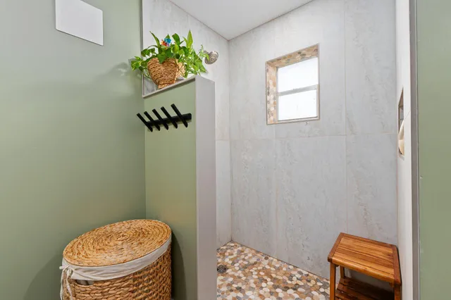 a chair and table in front of a house