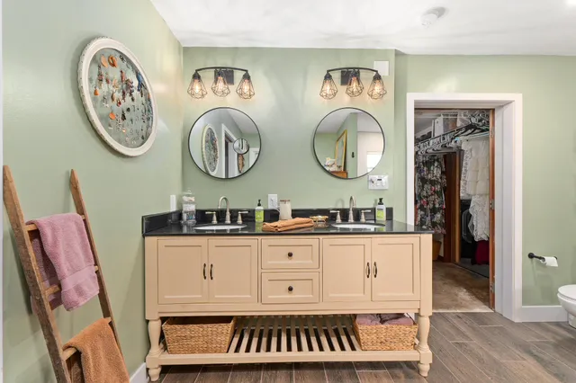 a view of a park with large trees