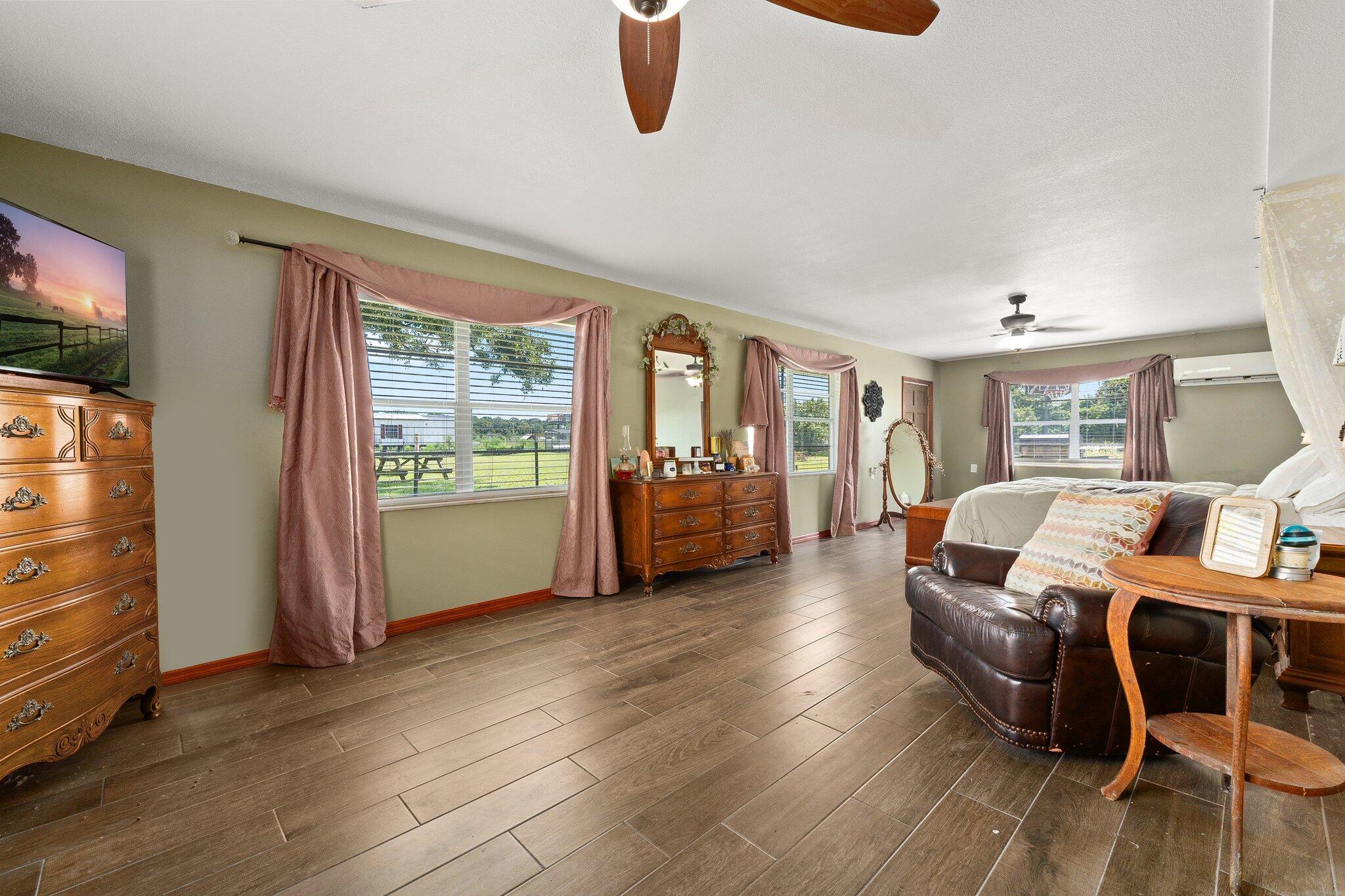 340 North Ffa Road Fort Pierce, FL 34945 - Photo 40 of 72 a bed room with furniture and a window