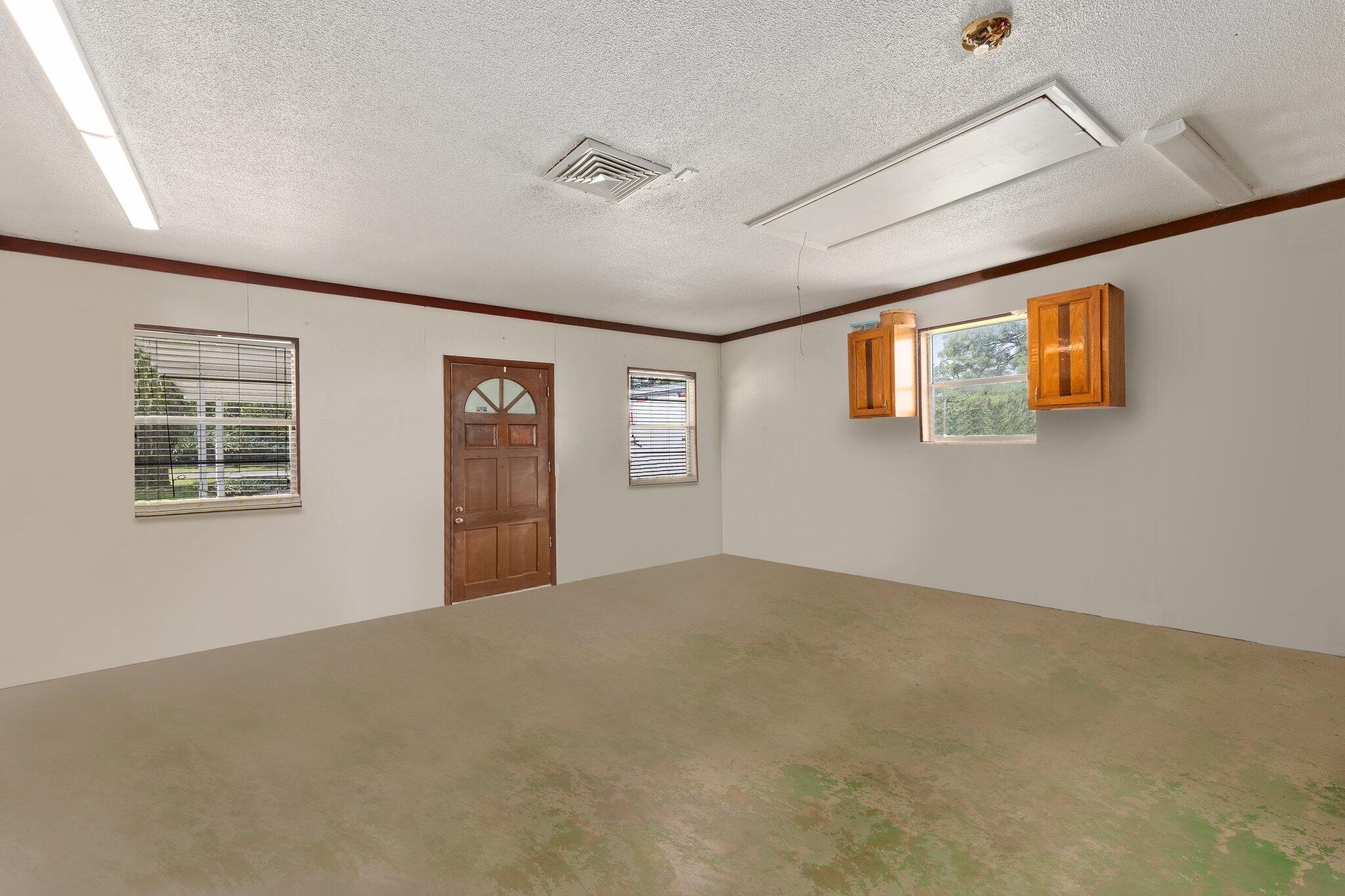 340 North Ffa Road Fort Pierce, FL 34945 - Photo 43 of 72 a view of an empty room with windows