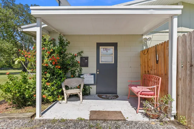 a view of a house with a big yard