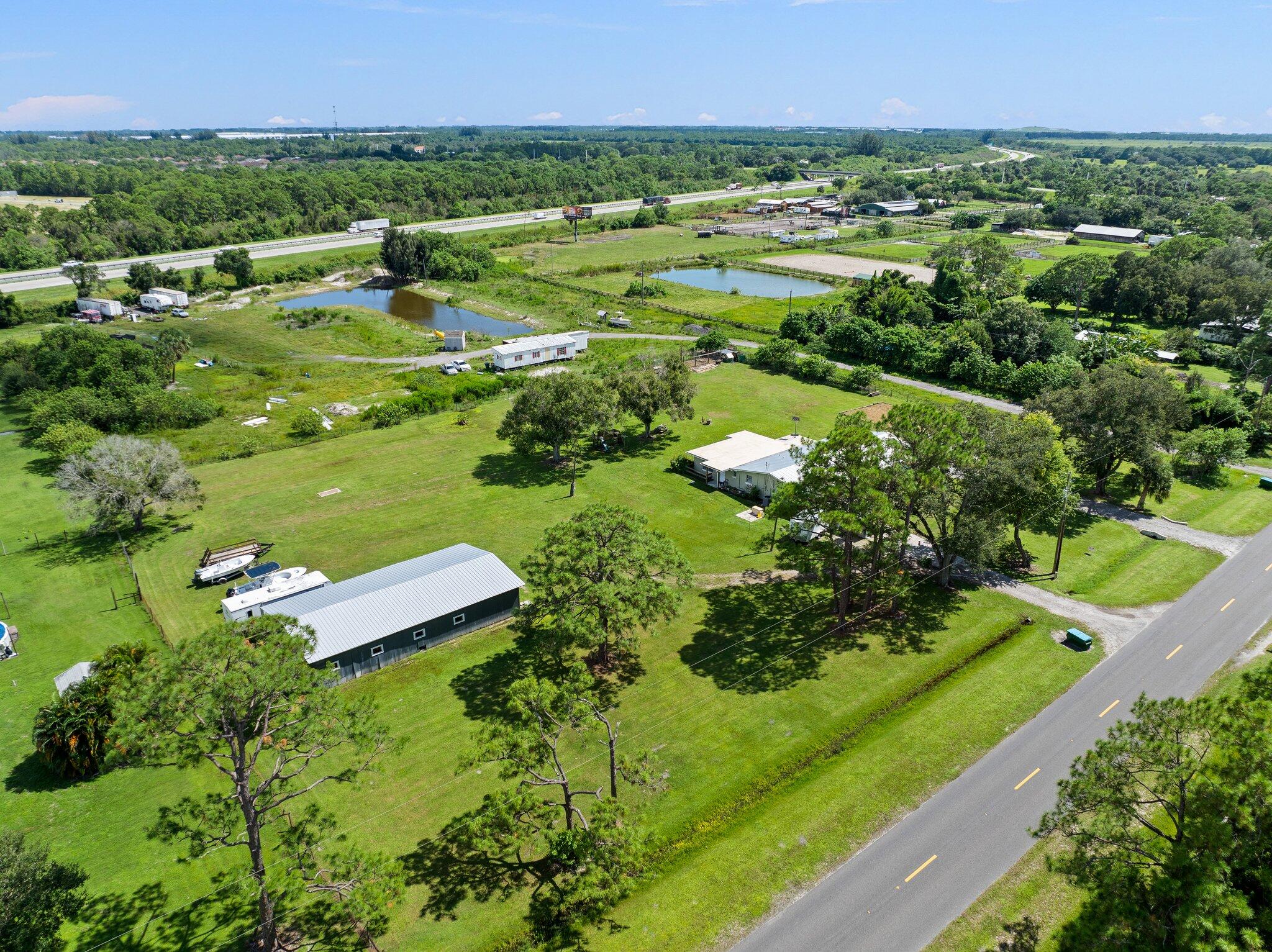 340 North Ffa Road Fort Pierce, FL 34945 - Photo 55 of 72 a view of a garden with an outdoor space