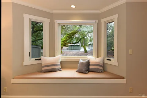 a bathroom with a double vanity sink a mirror and a