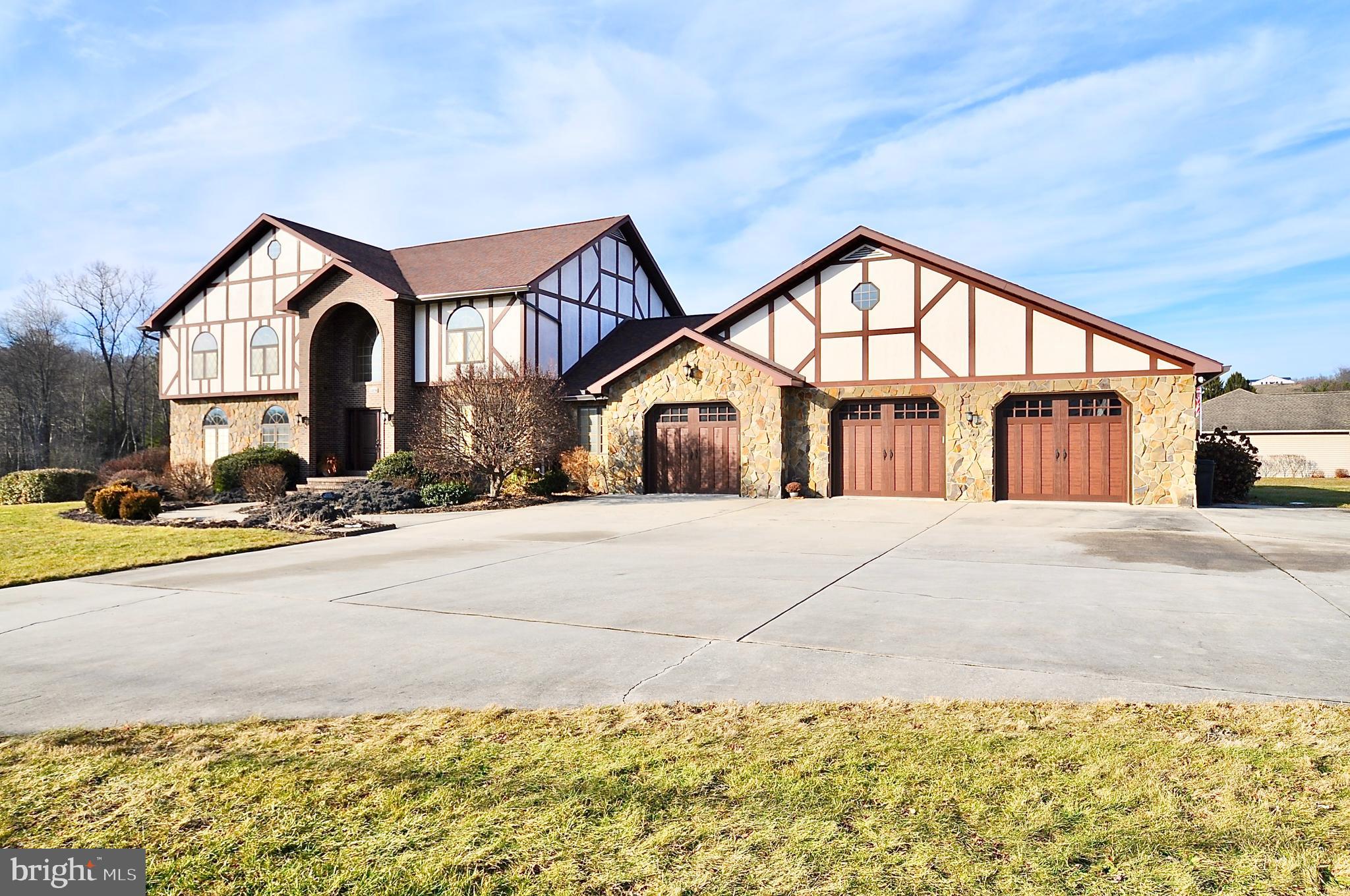 13370 South Eagle Valley Road Tyrone, PA 16686 - Photo 1 of 43 a front view of a house with a yard