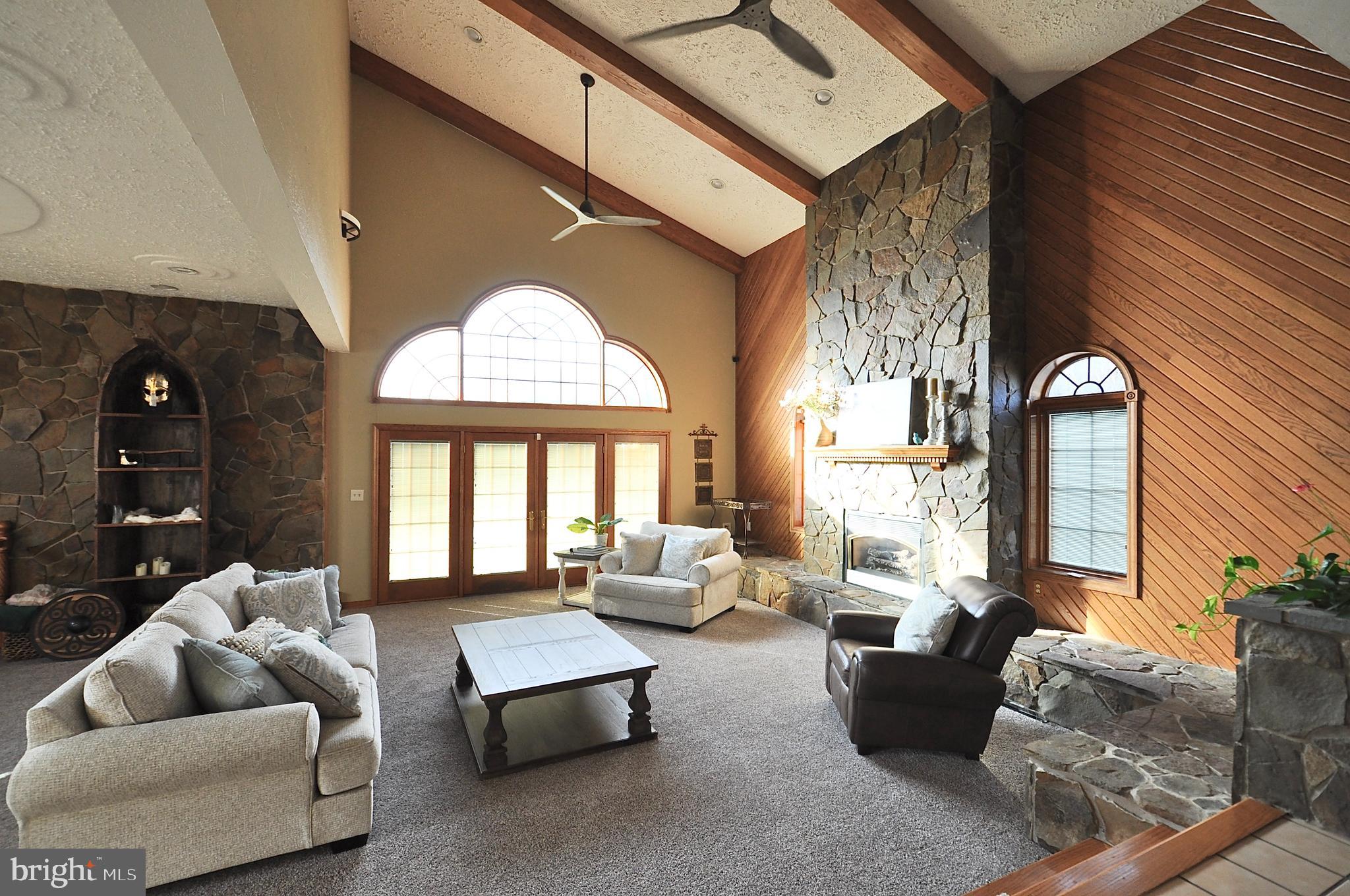 13370 South Eagle Valley Road Tyrone, PA 16686 - Photo 11 of 43 a living room with furniture and a large window
