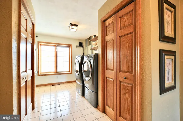 a view of a bathroom from a hallway
